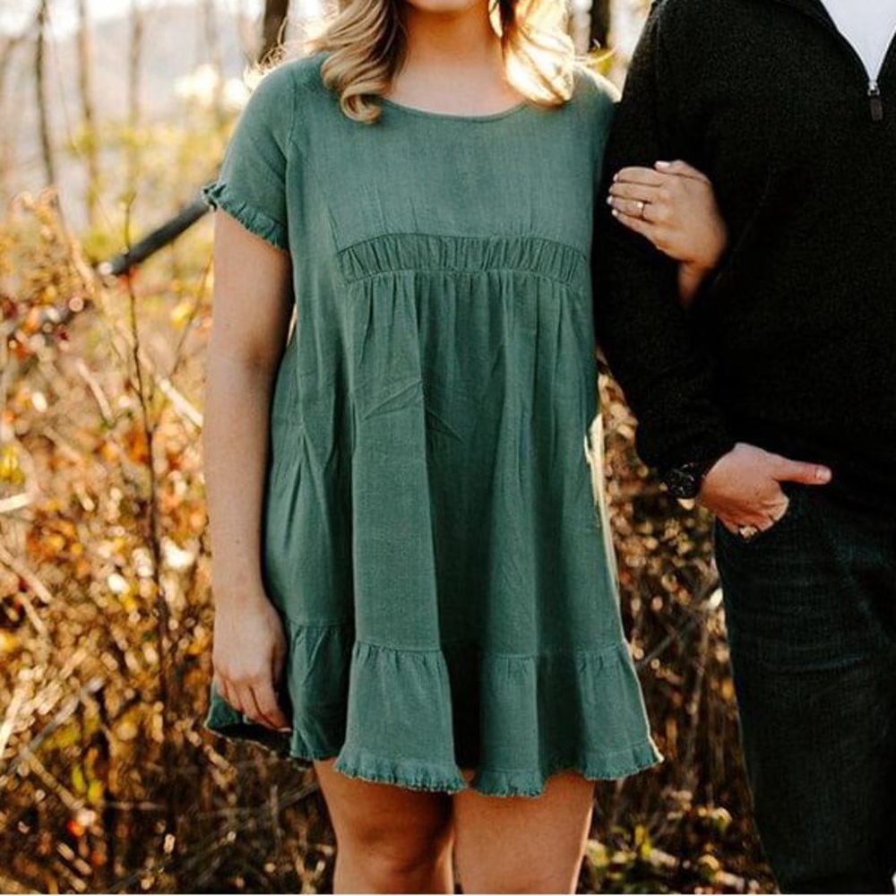 Linen blend round neck dress with fringe short sleeves and scoop hem